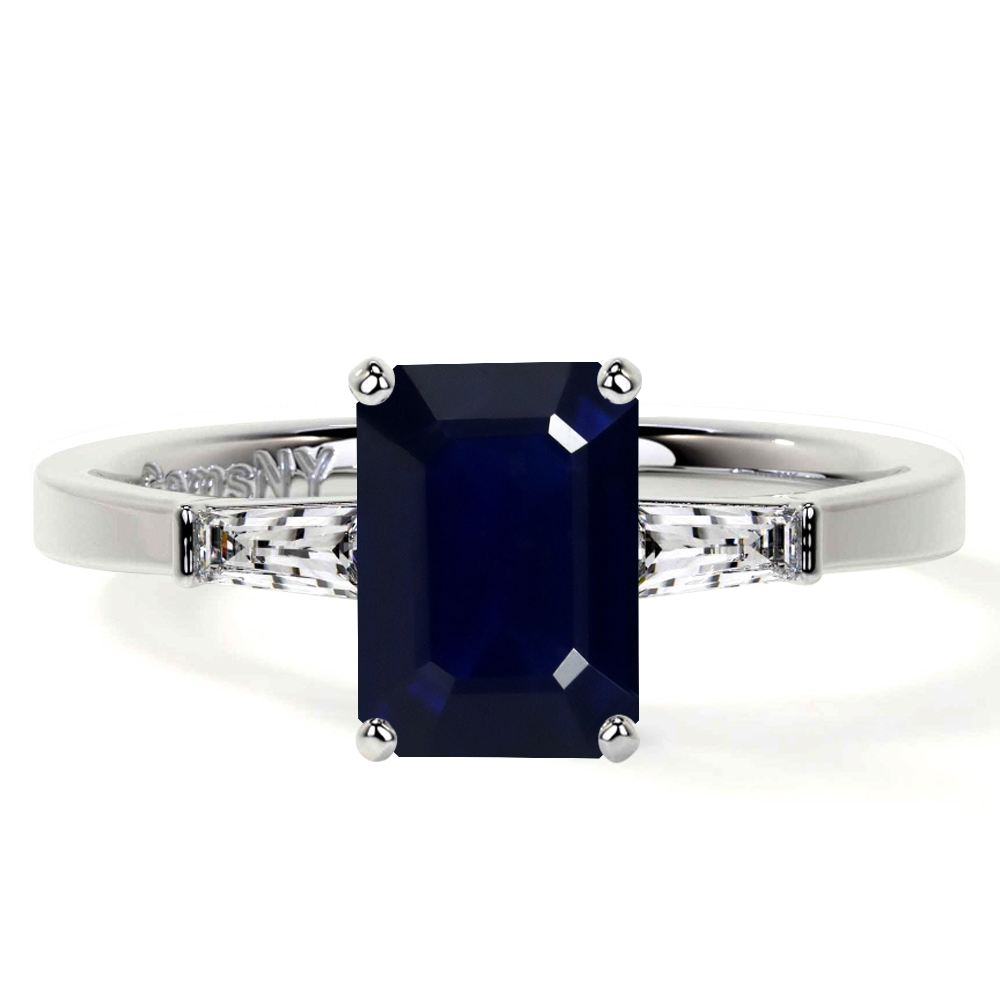 Emerald cut sapphire on sale with diamond baguettes