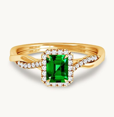 Emerald Cut Emerald Prong Set Halo Ring With Round Diamonds