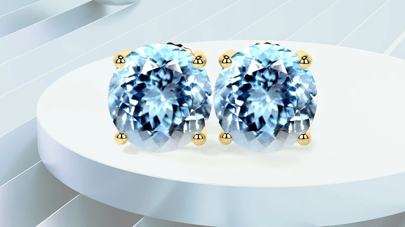 two round-shaped aquamarines