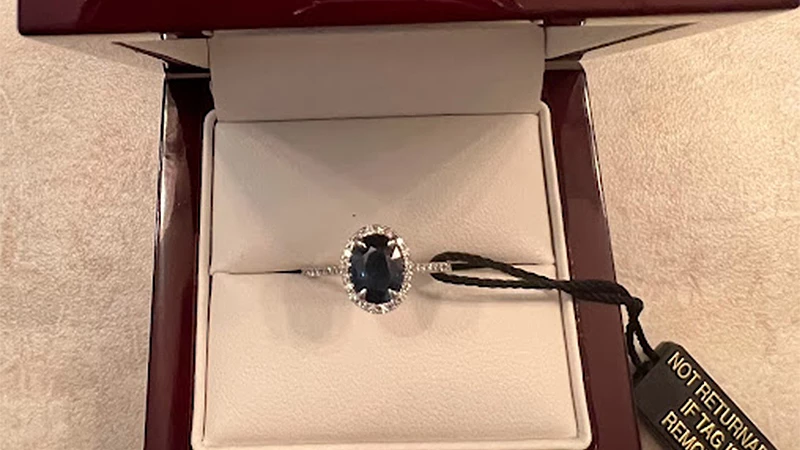 Oval-cut Blue Sapphire Diamond Halo Ring