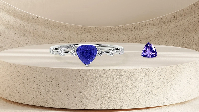 Trillion-cut tanzanite and diamond ring