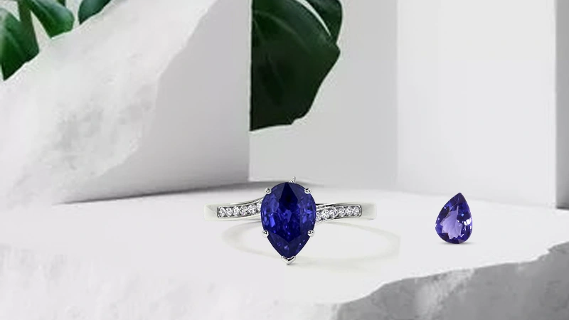 Pear cut tanzanite and diamond ring