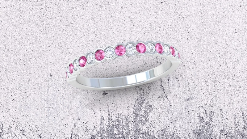 Round Diamond and Pink Sapphire Half-Bezel Wedding Band