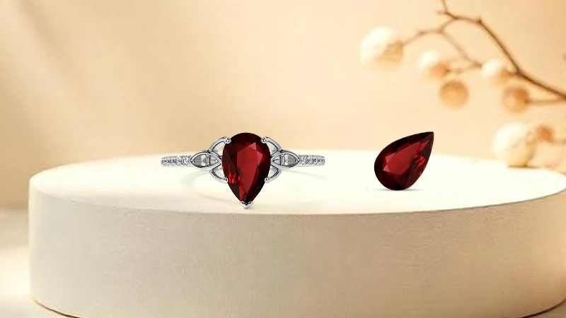 Pear-shaped ruby ring in Celtic style