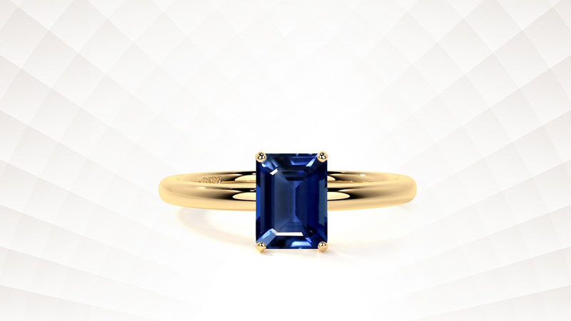 Emerald-cut Blue Sapphire Solitaire Ring