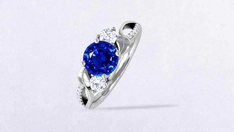 Three-Stone Round Untreated Blue Sapphire ring with Round Side Diamonds and Pave Diamond Accents