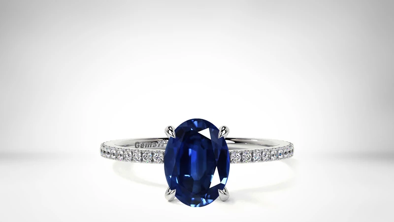 Pavé-set Oval-cut Sapphire Ring