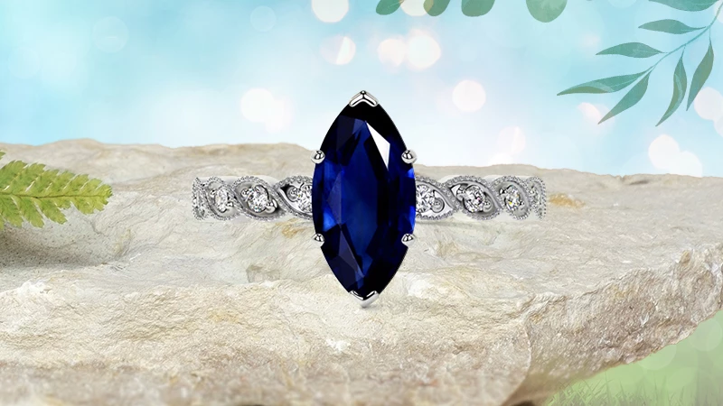 Side-stone Sapphire Engagement Ring