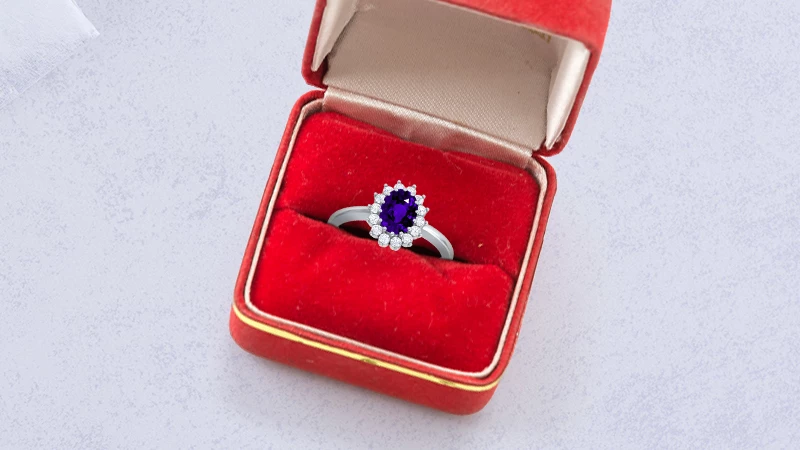 Tanzanite halo engagement ring