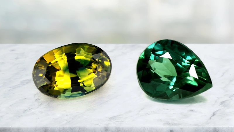 yellow-green bi-color sapphire and a teal sapphire