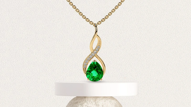 Pear Cut Pendant With Round Diamonds