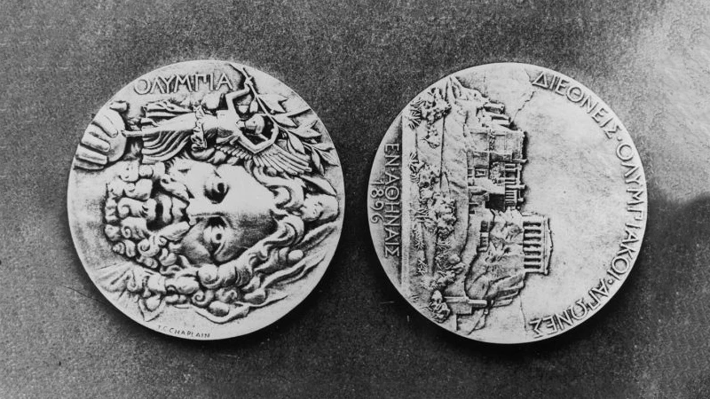 black and white image of olympics medals