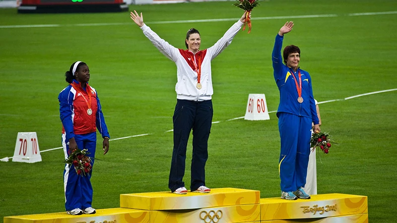 athletes being rewarded with medals