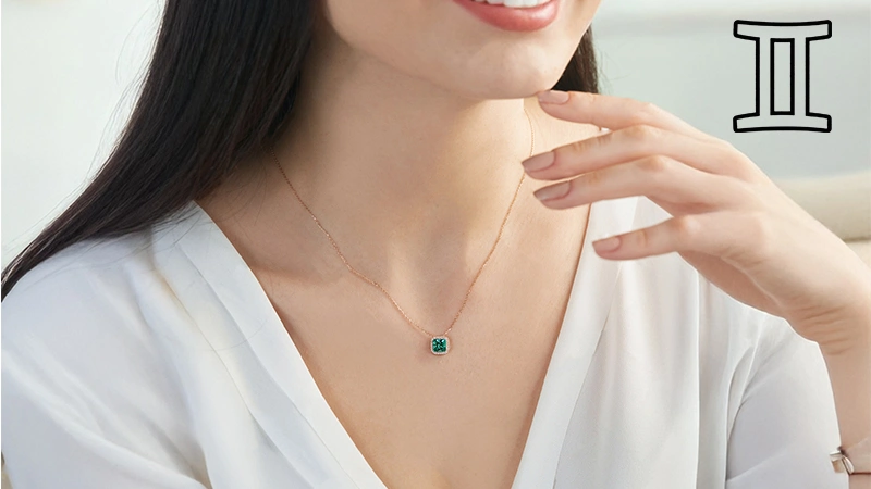 woman wearing an alexandrite pendant necklace