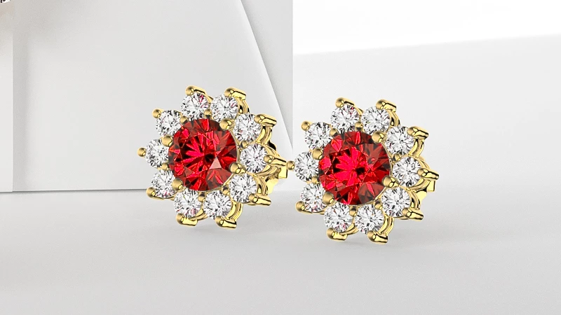 round ruby studs in yellow gold setting