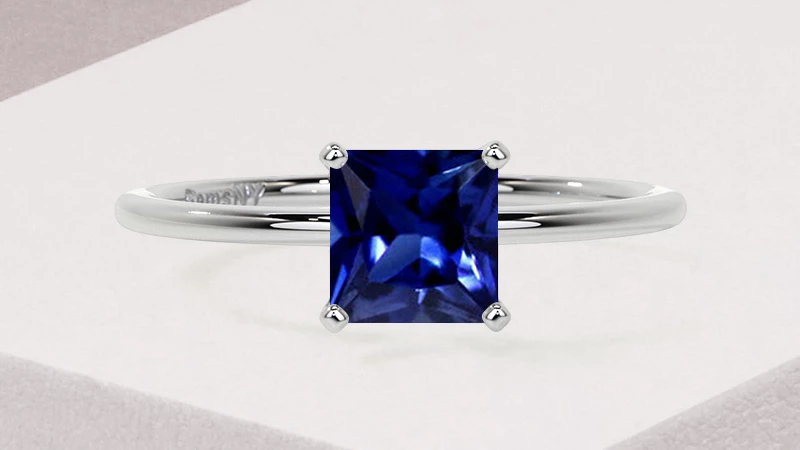 square-cut blue sapphire ring in white gold setting