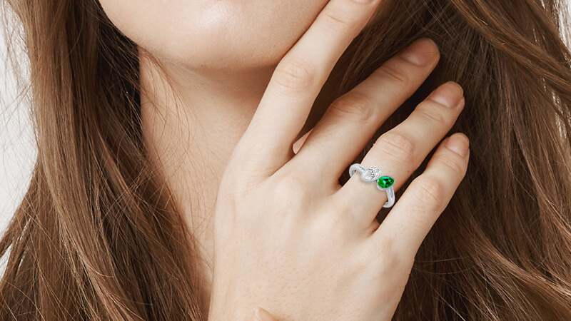 Toi et Moi emerald and diamond pear cut ring
