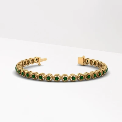 Round prong set emerald bracelets