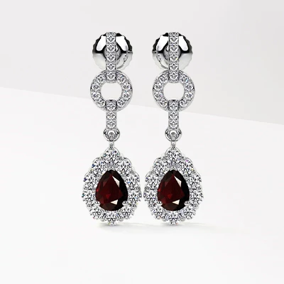 Pear cut ruby dangle earrings