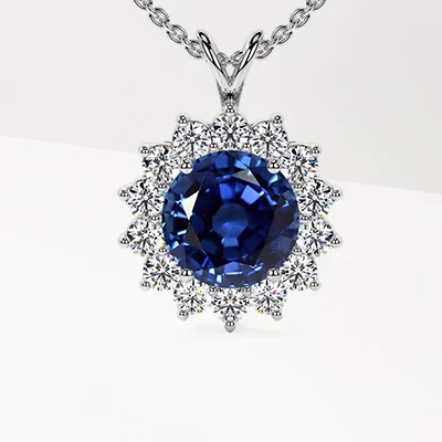 Round sapphire pendant with diamonds