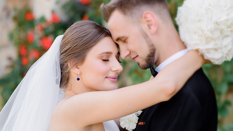 girl in gown blue dangle sapphire earrings