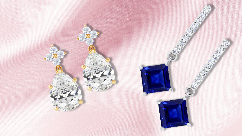 diamond stud earrings and sapphire dangle earrings