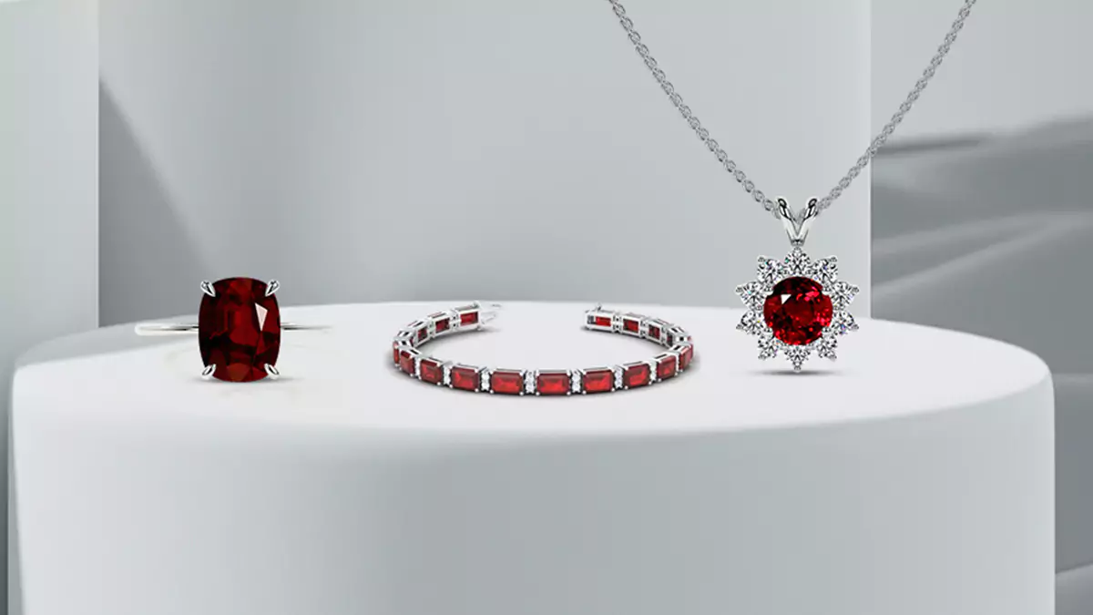 traditional ruby solitaire ring, chunky bracelet, shell necklace