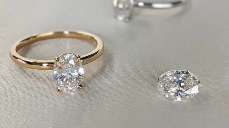 lab made diamond stone and a lab created diamond ring