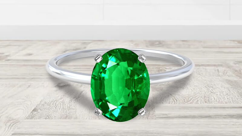 Oval-shaped Emerald Engagement Ring