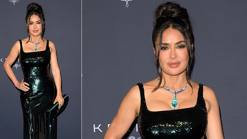Salma Hayek wearing emerald and diamond pendant
