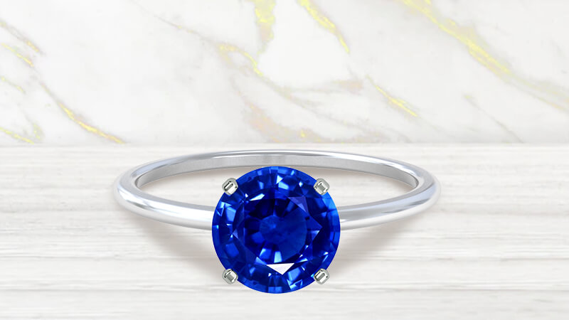 Round-shaped Sapphire Engagement Ring