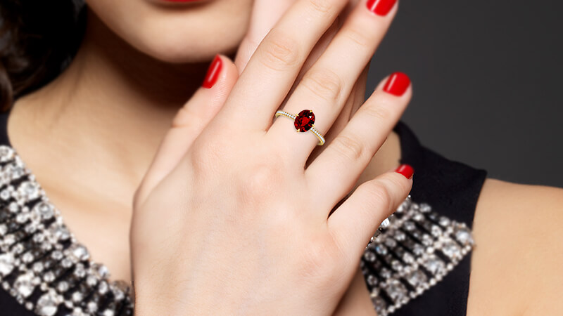 Women Showing Her Ruby Engagement Ring