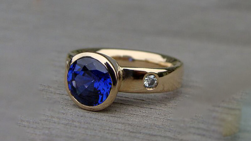 Blue sapphire ring with Bezel setting