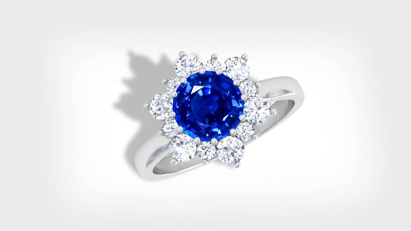 Blue sapphire ring with diamond halo setting
